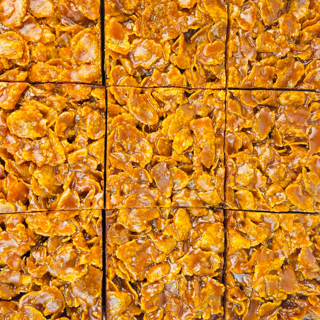 Crispy cornflake treats cut into square pieces