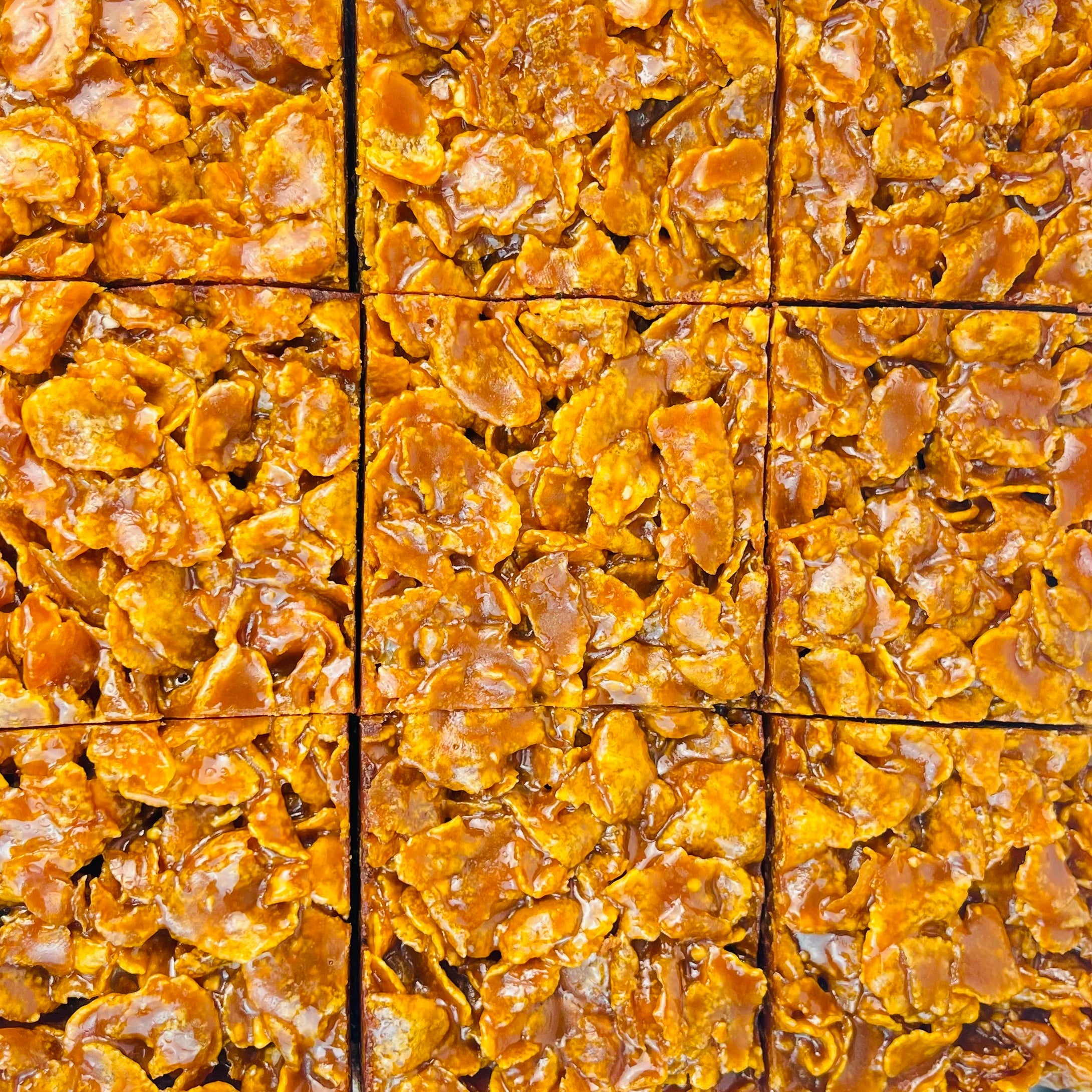 Crispy cornflake treats cut into square pieces