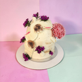 Decorative cake with flowers on a pastel background
